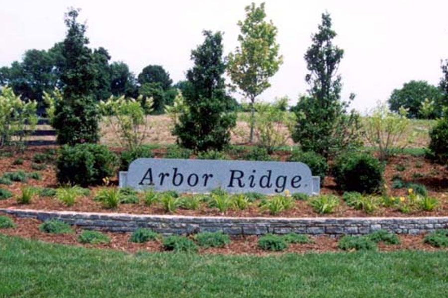 the entrance sign for Arbor Ridge